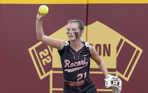 Rocori’s Madilyn Molitor shows that she caught the ball in right field during the top of the fifth inning in the Class 3A softball state championshi