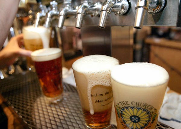In a June 6, 2008, file photo, a row of freshly poured draft beers are seen in Pittsburgh.