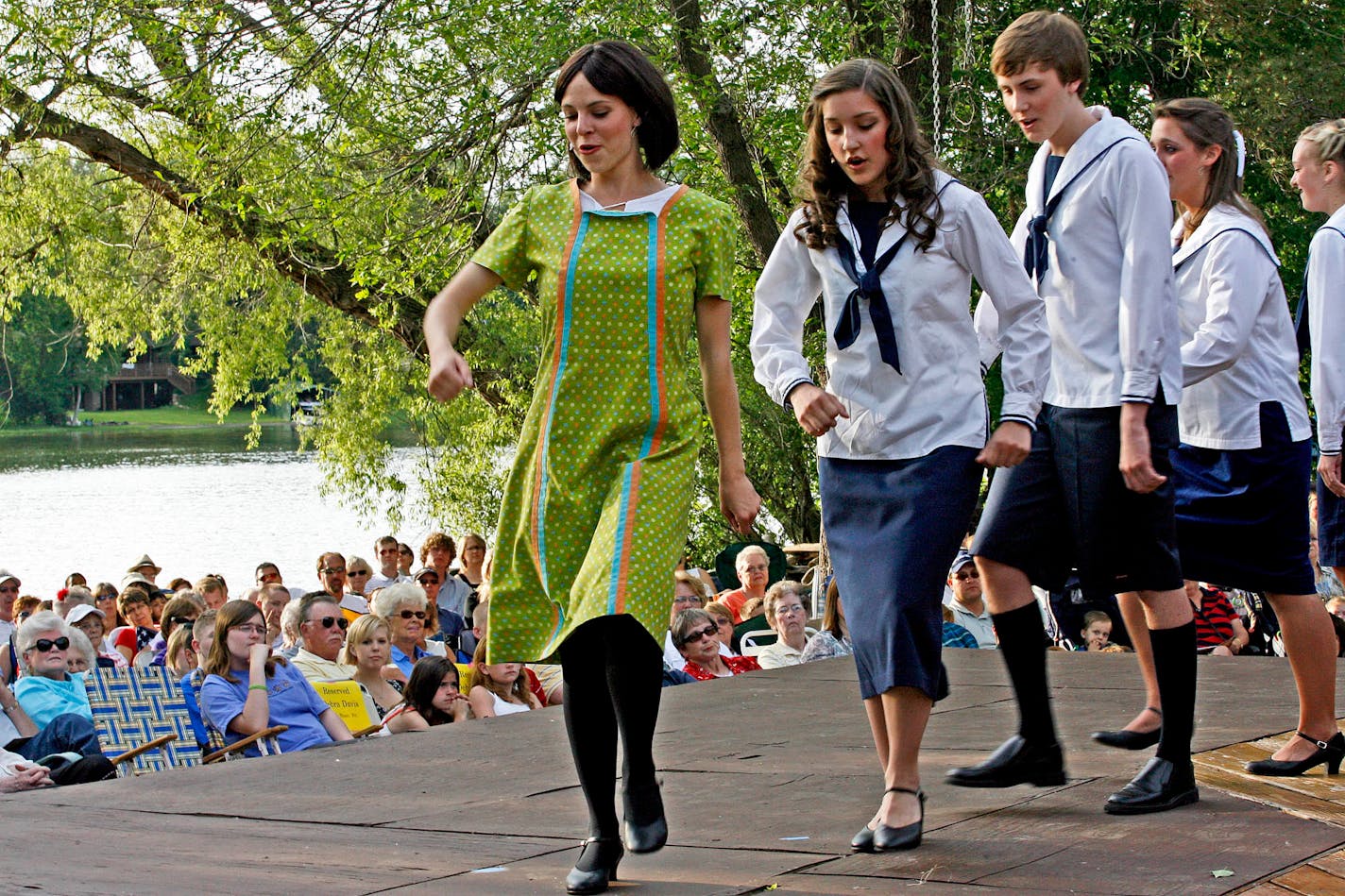 Katie Irvin, as Maria Rainer, the nanny to the Von Trapp family, led the cast in a dance step Wednesday. The Irvin-Grove family chose "The Sound of Music" as their final show for one main reason: "It's got seven kids in a music-making family," 16-year-old director Nate Irvin said. "It's all about what we're about."