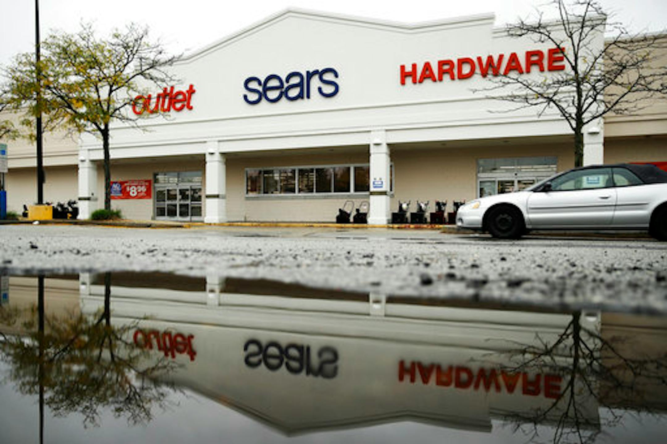 A sign for a Sears Outlet department store is displayed in Norristown, Pa., Monday, Oct. 15, 2018. Sears Hometown and Outlet Stores, Inc. is not part of the Sears Holdings Corp.'s Chapter 11 bankruptcy filing on Oct. 15. Sears Hometown and Outlet Stores separated from Sears Holdings in 2012. (AP Photo/Matt Rourke)