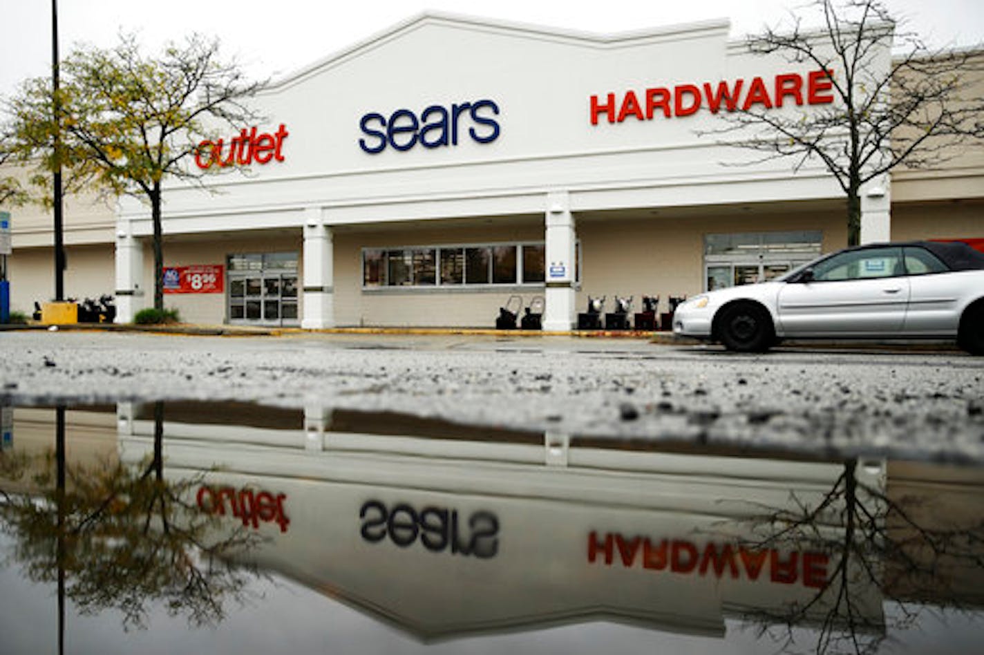 A sign for a Sears Outlet department store is displayed in Norristown, Pa., Monday, Oct. 15, 2018. Sears Hometown and Outlet Stores, Inc. is not part of the Sears Holdings Corp.'s Chapter 11 bankruptcy filing on Oct. 15. Sears Hometown and Outlet Stores separated from Sears Holdings in 2012. (AP Photo/Matt Rourke)