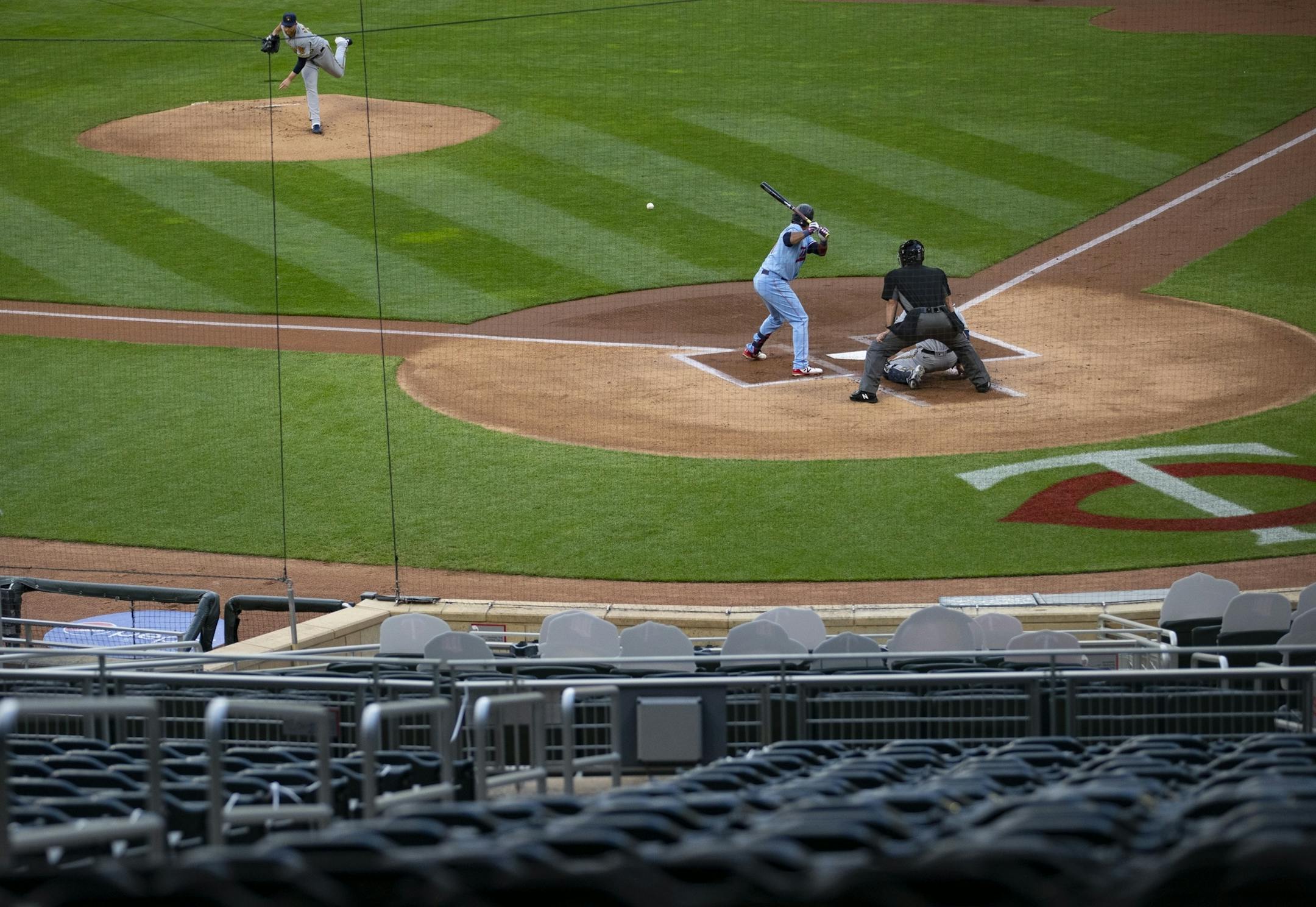 Milwaukee Brewers starting pitcher Brett Anderson (25) threw a pitch to Minnesota Twins shortstop Jorge Polanco (11) in the second inning on Wednesday night.