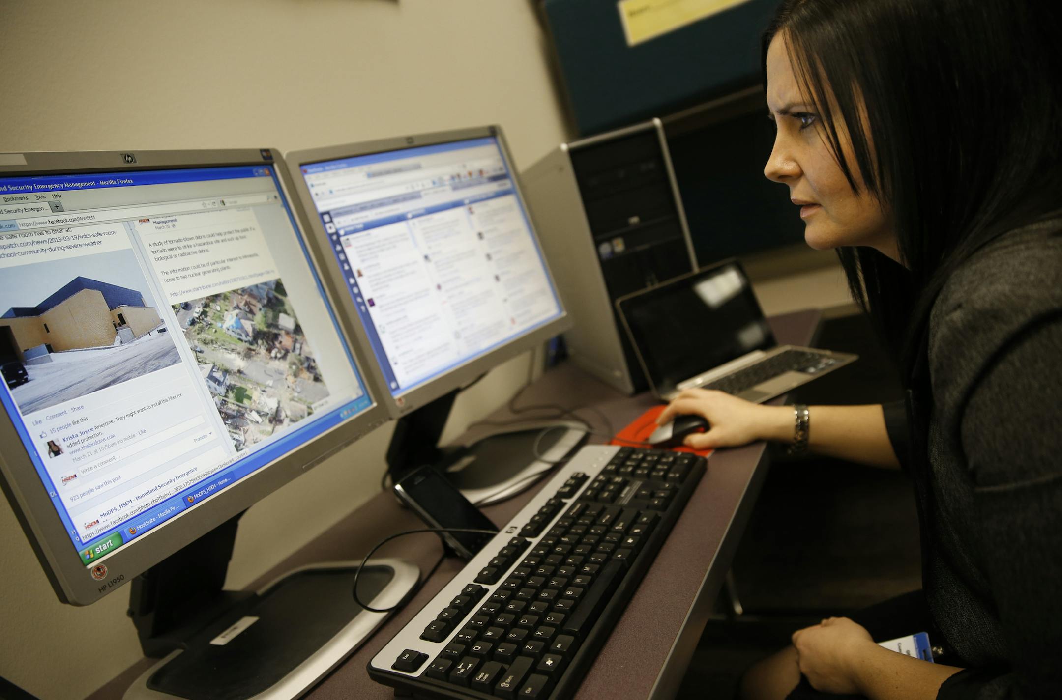 At the Homeland Security Emergency Management office in St. Paul, public information officer Jen Longaecker will be one of the officers responsible for moderating the #mnflood2013 hashtag on Twitter .]rtsong-taatarii@startribune.com