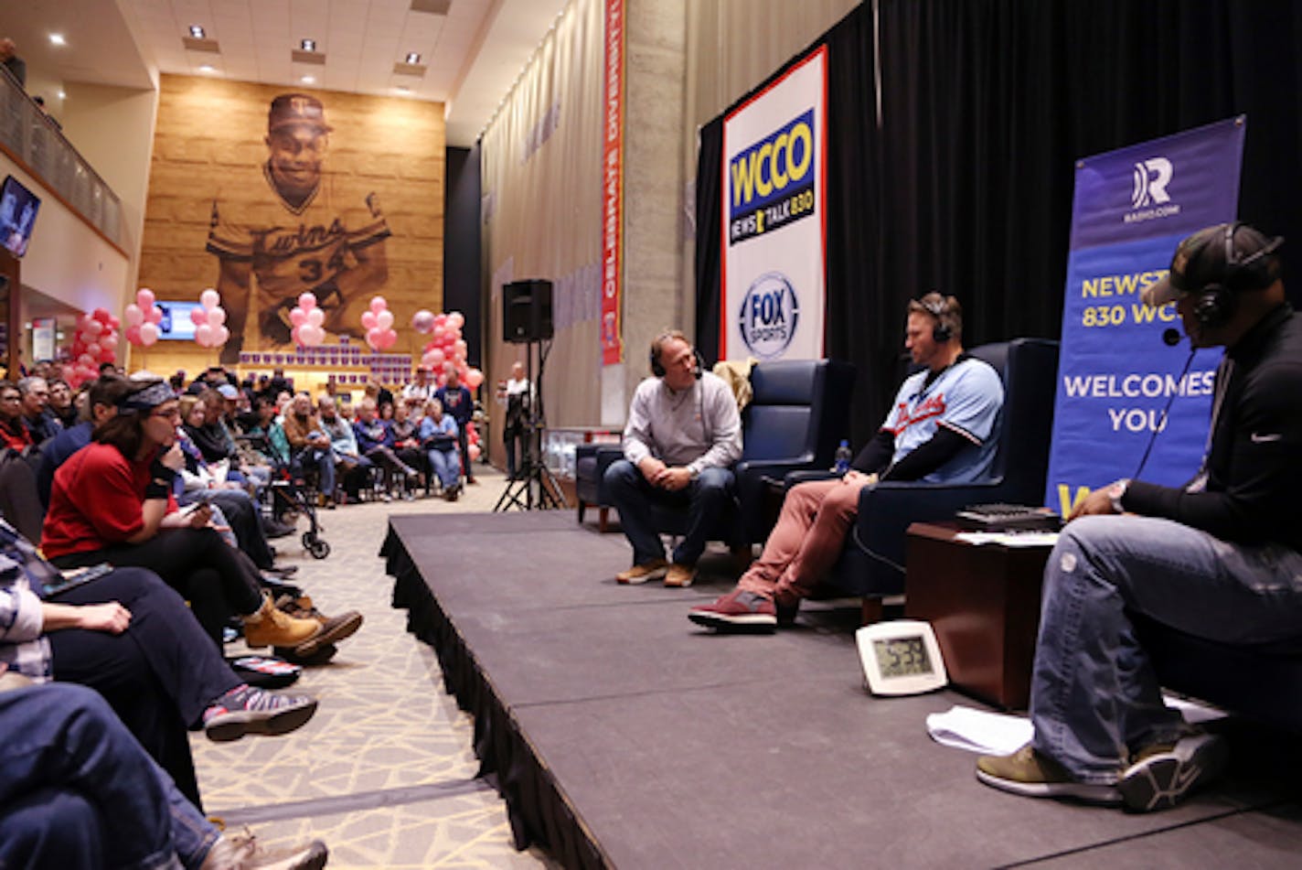 Minnesota Twins' Josh Donaldson is interviewed by Twins radio broadcaster Dan Glidden, left, and WCCO broadcaster Henry Lake, right, the baseball team's TwinsFest, Friday, Jan. 24, 2020, in Minneapolis. (AP Photo/Stacy Bengs)