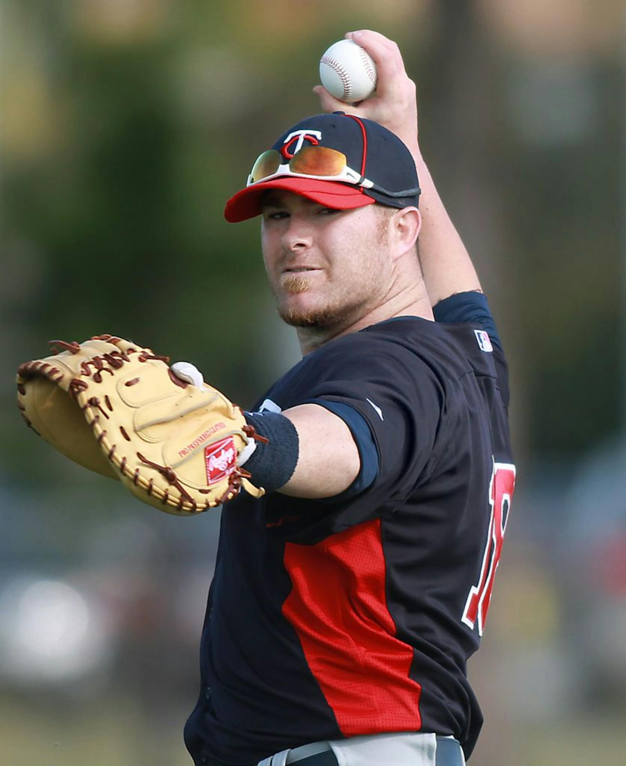 Minnesota Twins catcher Ryan Doumit warmed up during practice at Hammond Stadium, Tuesday, February 21, 2012 in Ft. Myers, FL. (ELIZABETH FLORES/STAR TRIBUNE) ELIZABETH FLORES � eflores@startribune.com