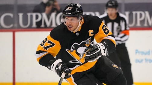 Pittsburgh Penguins' Sidney Crosby skates during an NHL hockey game against the New Jersey Devils in Pittsburgh, Tuesday, April 20, 2021. (AP Photo/Gene J. Puskar)