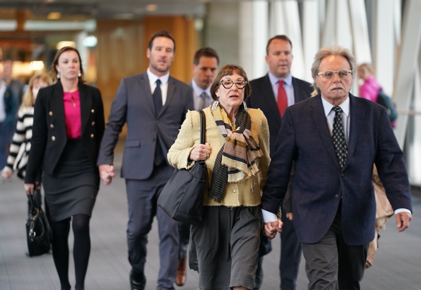 Justine Damond's family headed into the Hennepin Government Center before the verdict was read on Tuesday.