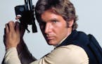 Harrison Ford stars as Han Solo in the "Star Wars" films, but the character is played by a younger actor, Alden Ehrenreich, in the new film.