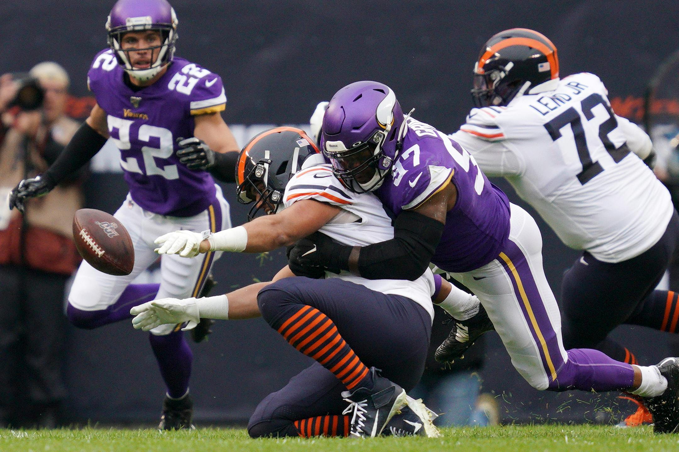 Minnesota Vikings defensive end Everson Griffen (97) knocked the ball loose from Chicago Bears tight end Trey Burton (80) in the first quarter. ] ANTHONY SOUFFLE • anthony.souffle@startribune.com The Minnesota Vikings played the Chicago Bears in an NFL football game Sunday, Sept. 29, 2019 at Soldier Field in Chicago.