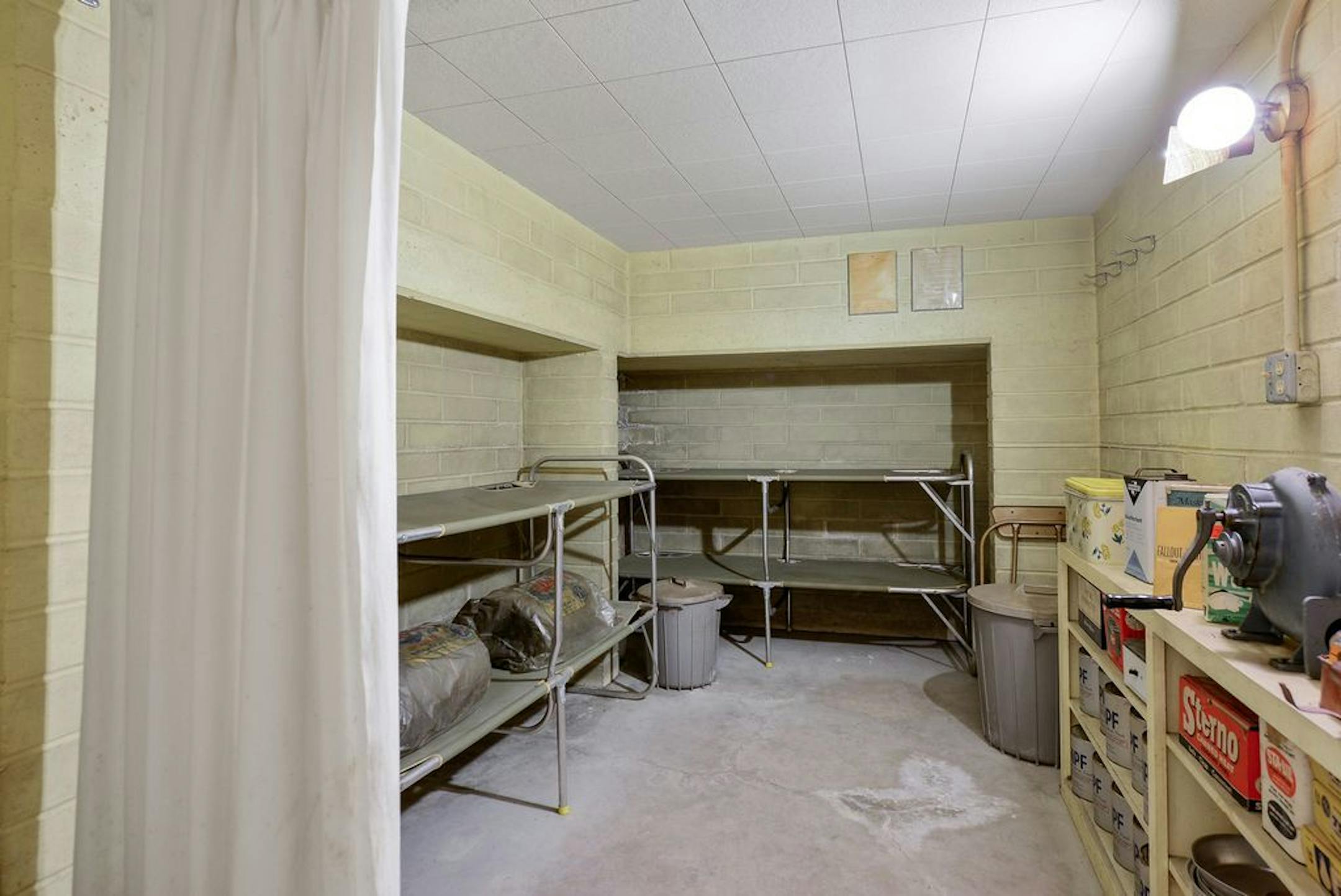 There's a bomb shelter, believed to have been added in 1950, still stocked with supplies.