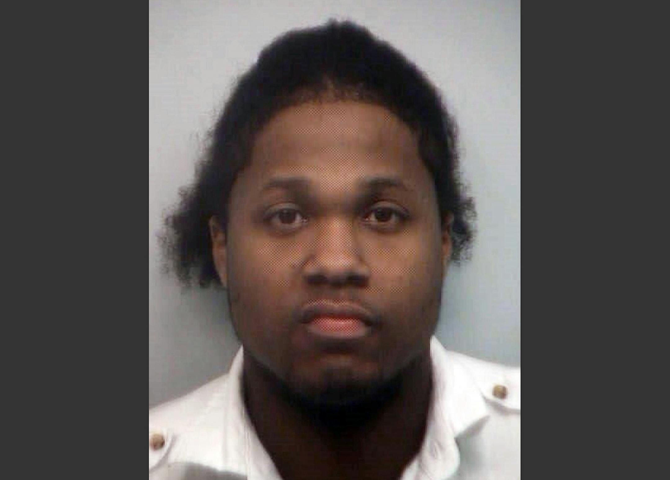 This 2010 booking photo provided by the Fulton County, Ga. Sheriff's office shows Ismaaiyl Brinsley after he was arrested on charges of terroristic threats, simple battery and marijuana possession. Brinsley ambushed two New York City police officers in their patrol car in broad daylight Saturday, Dec. 20, 2014, fatally shooting them before killing himself inside a subway station. (AP Photo/Fulton County Sheriff) ORG XMIT: MIN2014122114382554 ORG XMIT: MIN1412211514570251