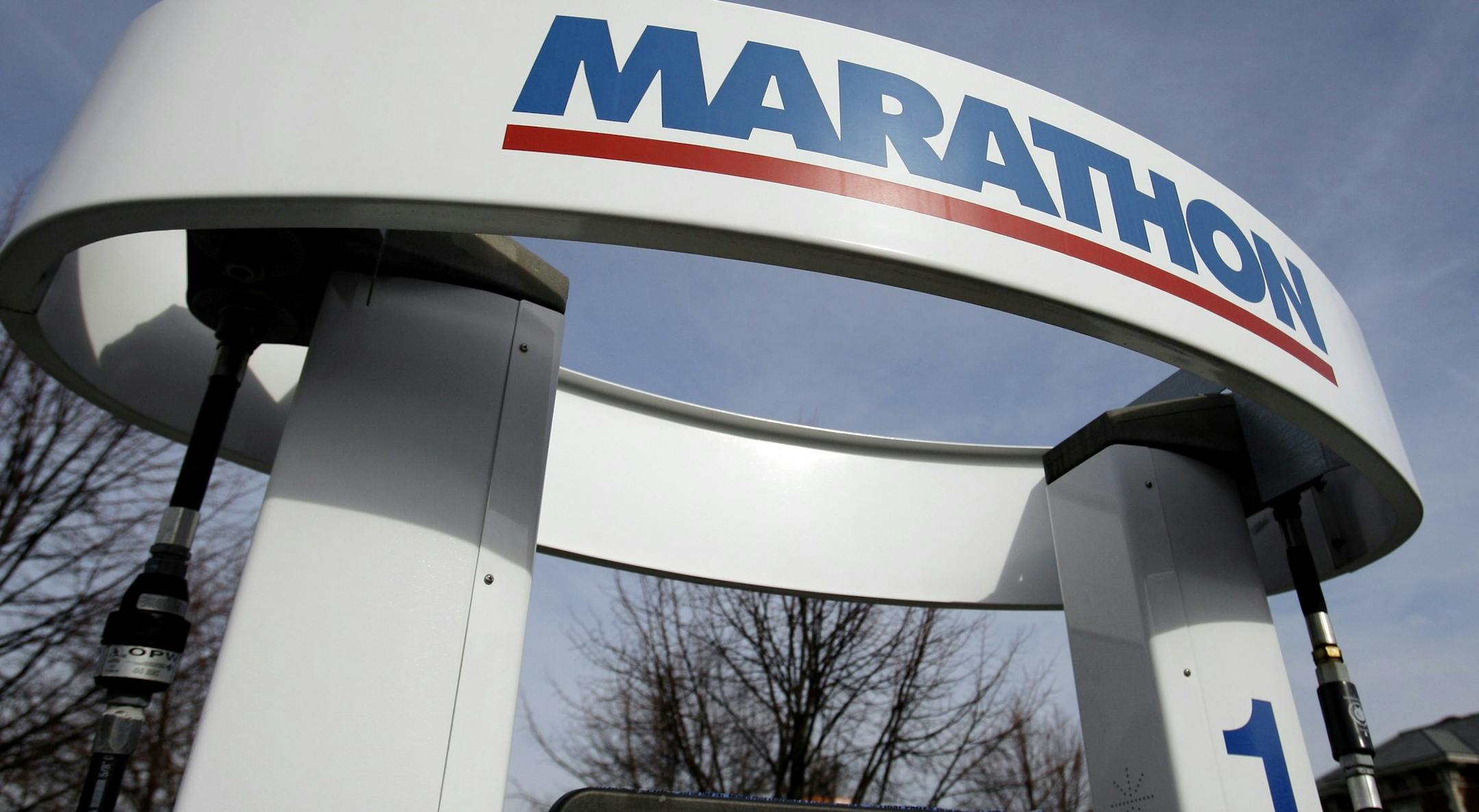 FILE - In this Feb. 1, 2010 file photo, the sign above a gas pump is shown at the Marathon gas station in Indianapolis. Marathon Oil said Tuesday, May 4, 2010, its first-quarter profit rose 62 percent as higher oil prices offset losses in the company's refining business.(AP Photo/Michael Conroy, file)