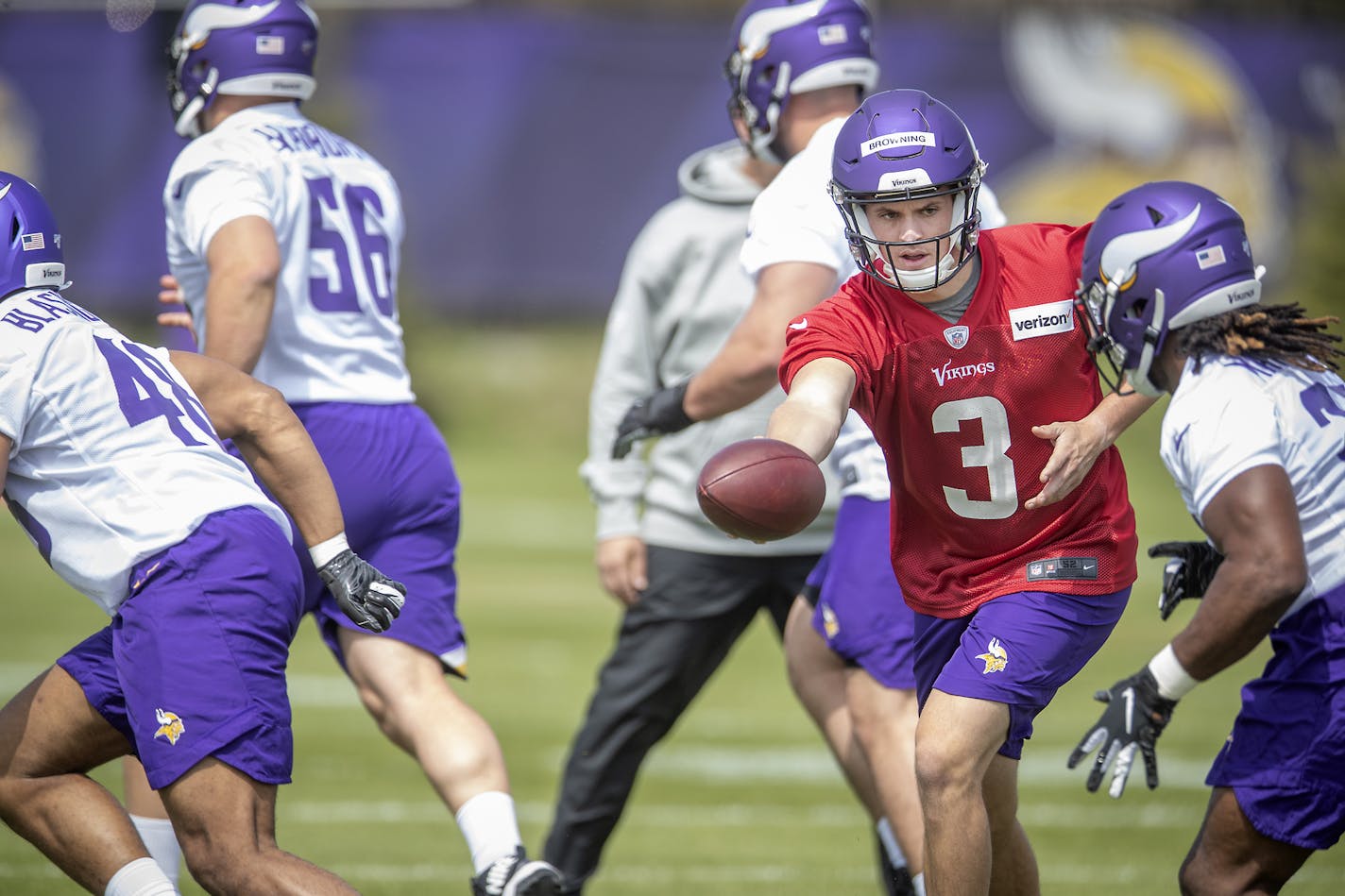 Vikings rookie quarterback Jake Browning practiced a handoff during a minicamp at the TCO Performance Center in Eagan in early May.