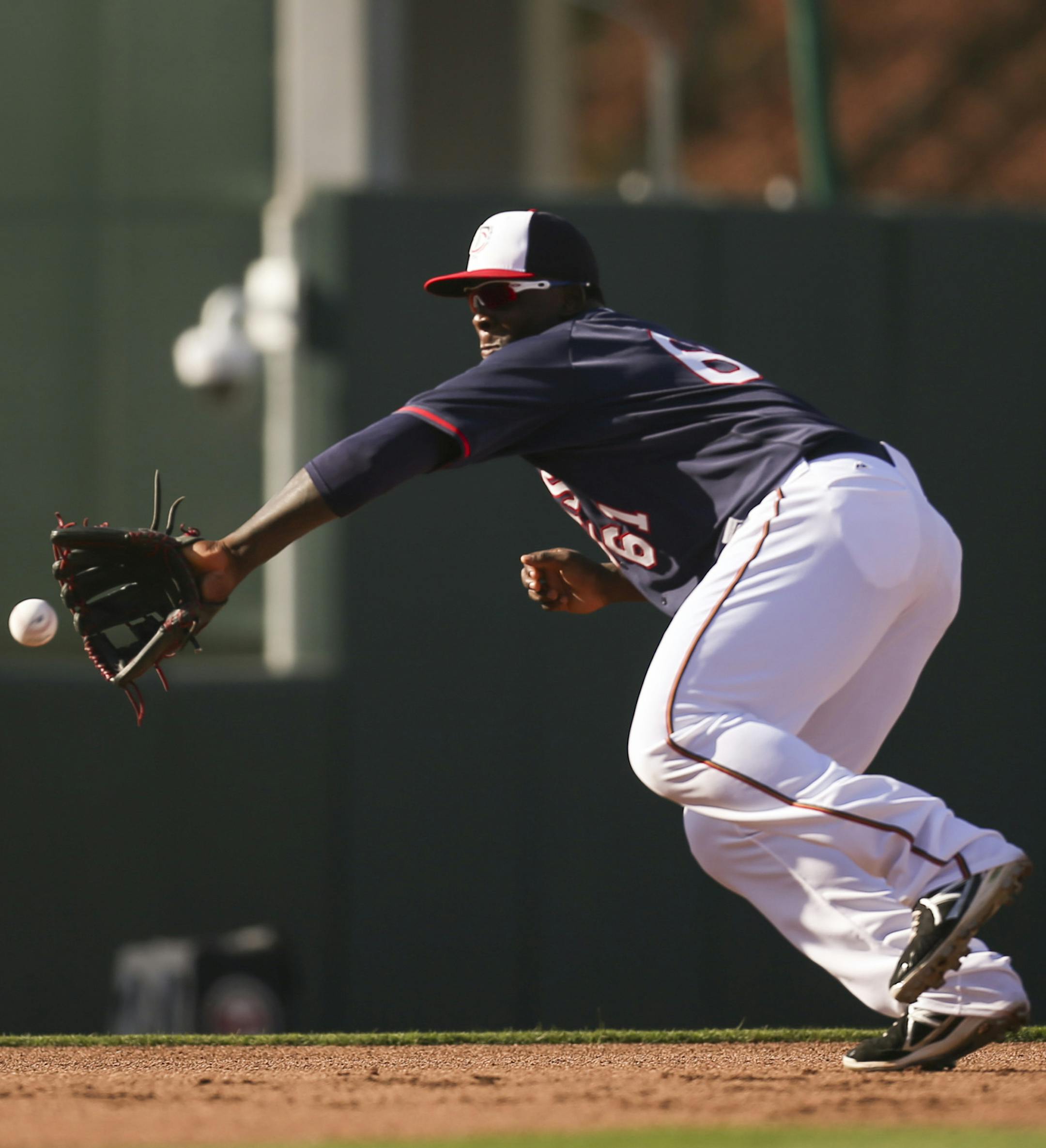 Twins third baseman Miguel Sano (61) fielded a grounder during infield practice before the game Wednesday evening at Hammond Stadium. ] JEFF WHEELER ï jeff.wheeler@startribune.com The Twins played their first exhibition baseball game against the University of Minnesota team Wednesday night, March 4, 2015, at Hammond Stadium in Fort Myers, FL. ORG XMIT: MIN1503061713300909