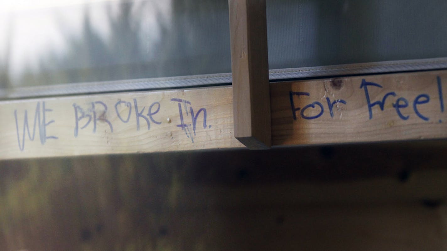 A taunting message was scribbled on a cabin at Afton State Park, one of numerous facilities to report damage over the holiday weekend.