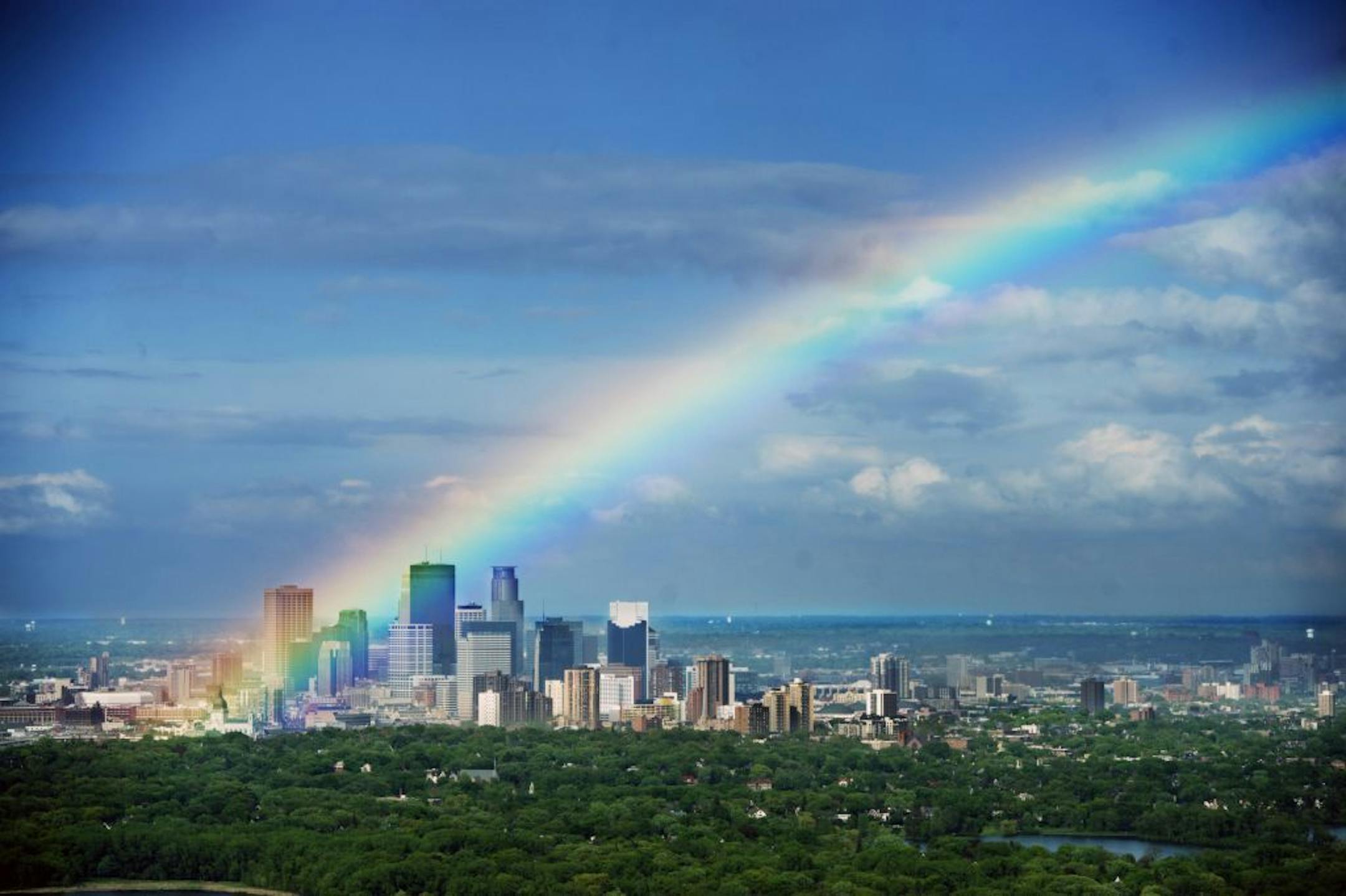 Downtown Minneapolis with a rainbow about 5:30 Sunday.