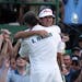 Bubba Watson is congratulated by caddie Ted Scott after winning the Masters in a sudden death playoff last year.