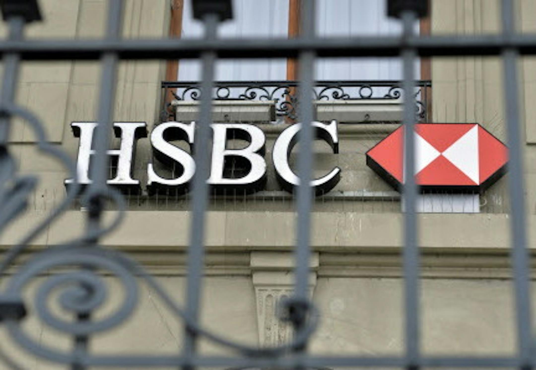 Th logo of HSBC Private Bank is pictured in Geneva, Switzerland, Wednesday. Feb. 18, 2015. Geneva prosecutors searched the premises of HSBC's Swiss subsidiary on Wednesday, after launching a money-laundering investigation over a report that the bank helped hide millions of dollars for drug traffickers, arms dealers and celebrities. (AP Photo/Keystone,Martial Trezzini)
