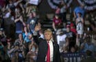 President Donald Trump is cheered by supporters at a rally in Great Falls, Mont., July 5, 2018. The United States and China hit each other with punish