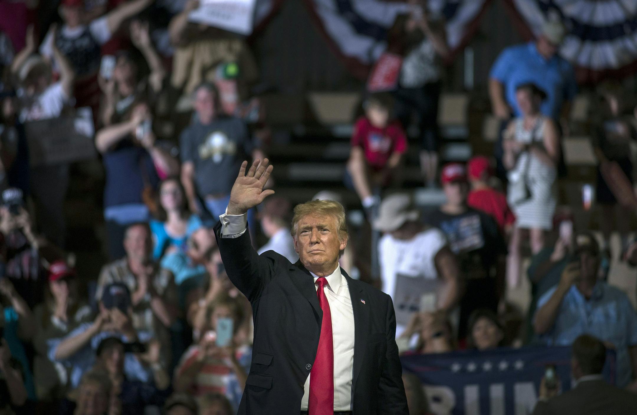 President Donald Trump is cheered by supporters at a rally in Great Falls, Mont., July 5, 2018. The United States and China hit each other with punishing tariffs on July 6, as the two nations tipped into a long-feared trade war that is only expected to escalate. (Gabriella Demczuk/The New York Times)