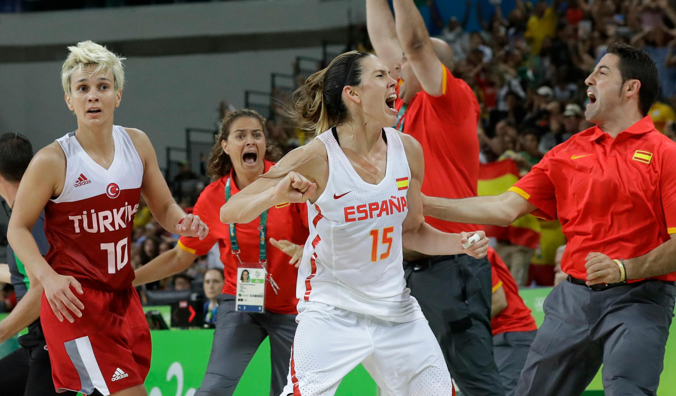 Spain's Anna Cruz (15) celebrates her winning shot over Turkey during a women's quarterfinal round basketball game at the 2016 Summer Olympics in Rio de Janeiro, Brazil, Tuesday, Aug. 16, 2016. (AP Photo/Eric Gay)