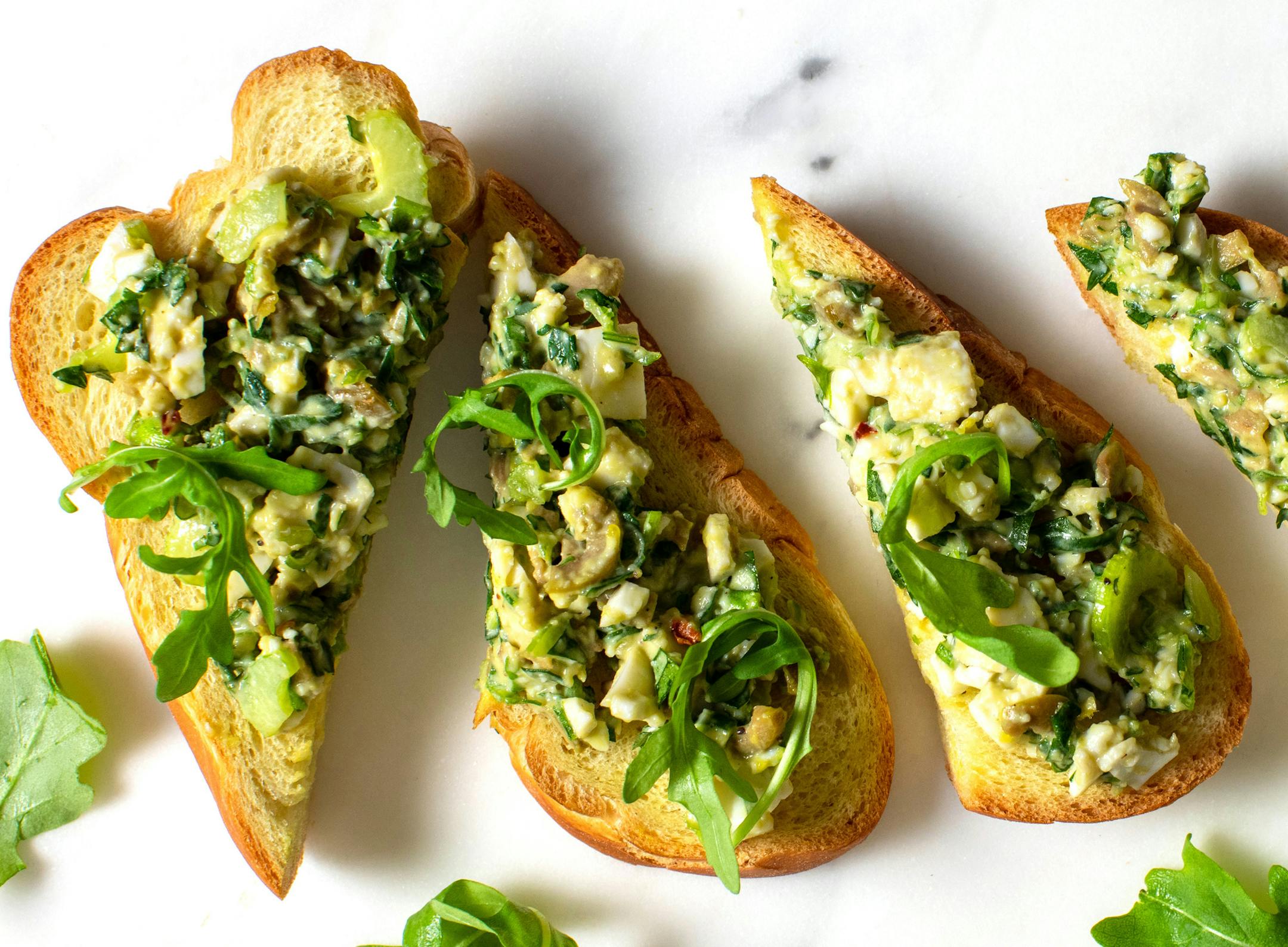 Egg salad sandwiches, in New York, Nov. 23, 2019. Sandwiches are a tried-and-true way to feed a room full of holiday revelers. Food Stylist: Iah Pinkney. (Andrew Scrivani/The New York Times) ORG XMIT: XNYT123