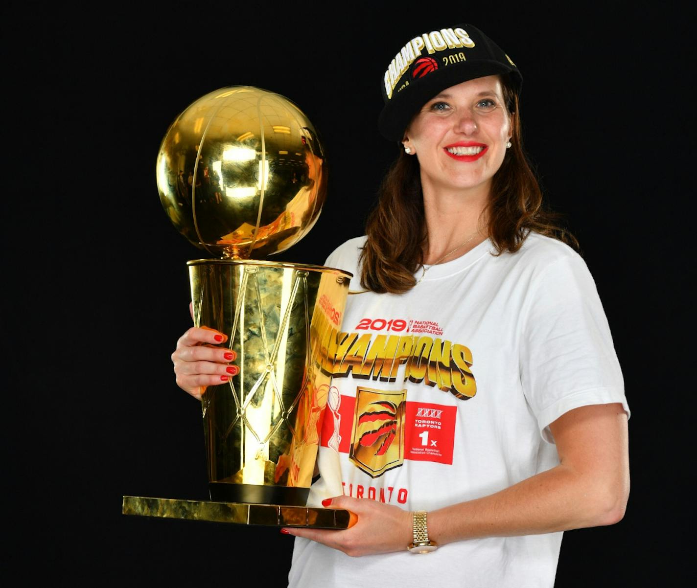 Lakefield native Teresa Resch, with the 2019 Larry O'Brien Championship Trophy won by the Toronto Raptors, was the first woman hired by Masai Ujiri, then the team's general manager.