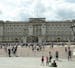 FILE - In this file photo dated Wednesday, June 24, 2015, tourists view the front facade of Buckingham Palace, the official London residence of Britai
