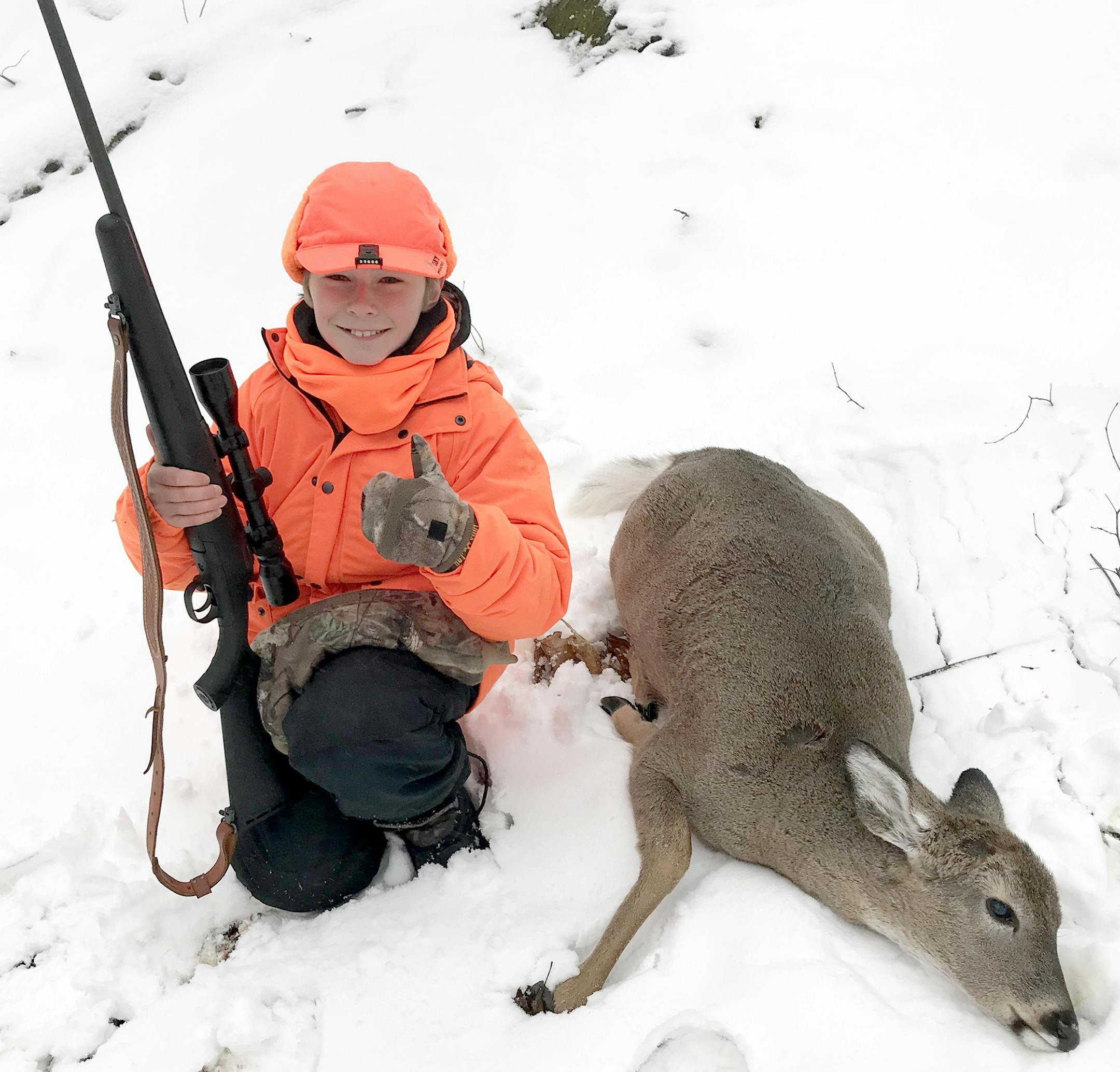 Zach Jones, 12, shot his first deer ever about 11 a.m. opening day near Park Rapids. He was in the midst of putting toe warmers on one of his feet when the deer first came into view.
