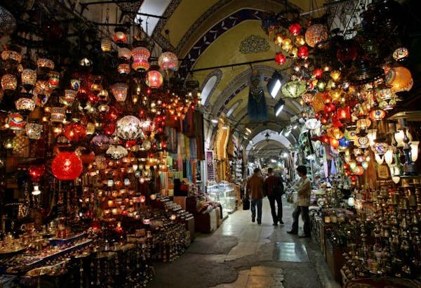 Visitors stroll through the Ottoman era Grand Bazaar in Istanbul, Turkey, Sept. 27, 2005.