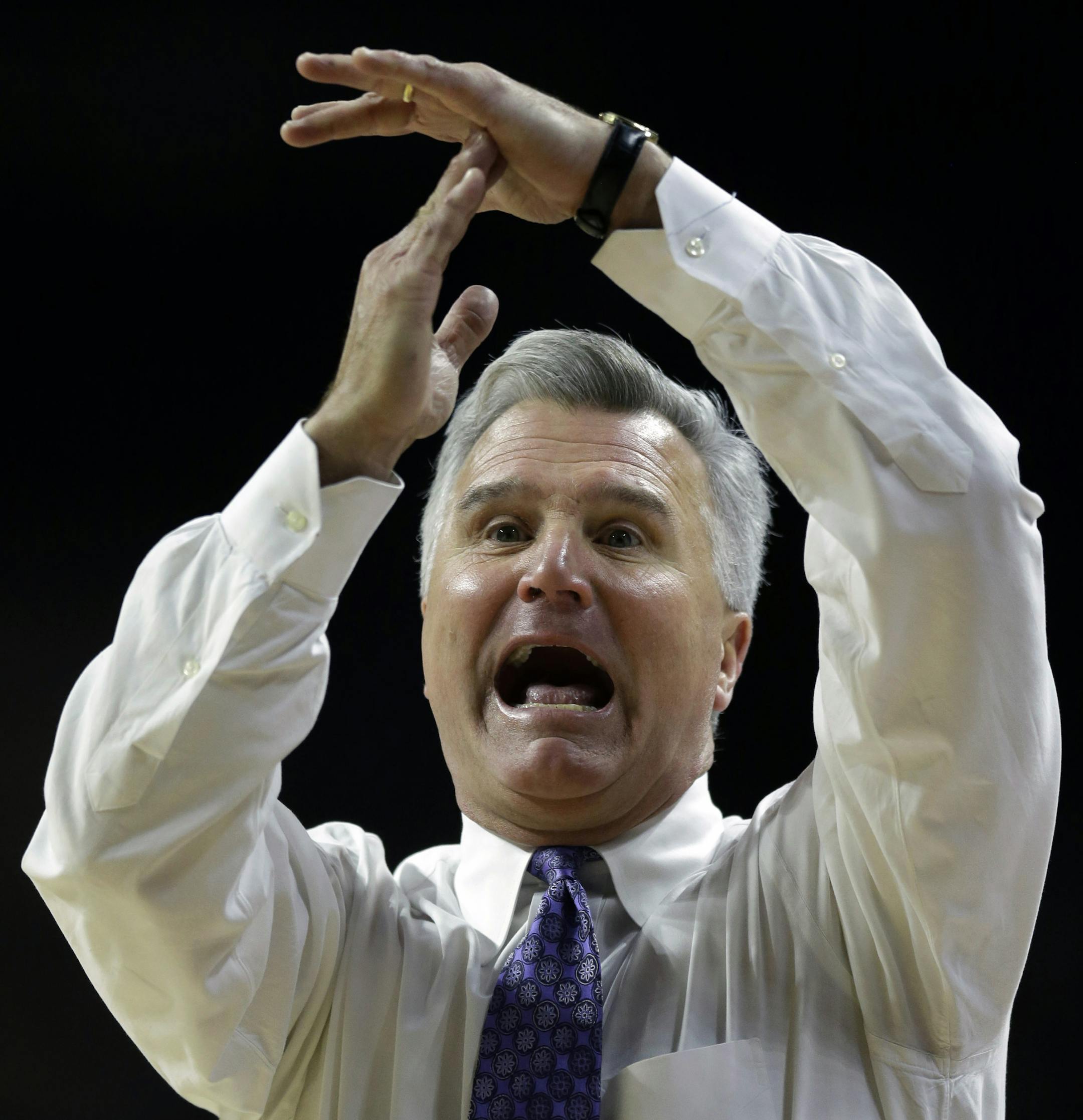 Kansas State head coach Bruce Weber calls a timeout during the first half of an NCAA college basketball game against Georgia in Manhattan, Kan., Wednesday, Dec. 31, 2014. Georgia defeated Kansas State 50-46. (AP Photo/Orlin Wagner) ORG XMIT: MIN2015010220114804