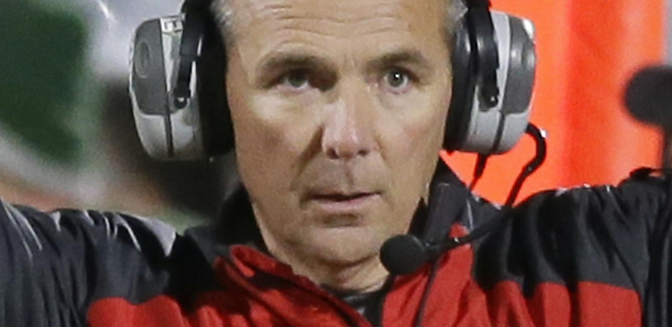 Ohio State coach Urban Meyer reacts on the sidelines during the first half of an NCAA college football game against Michigan State in East Lansing, Mich., Saturday, Nov. 8, 2014. (AP Photo/Carlos Osorio)