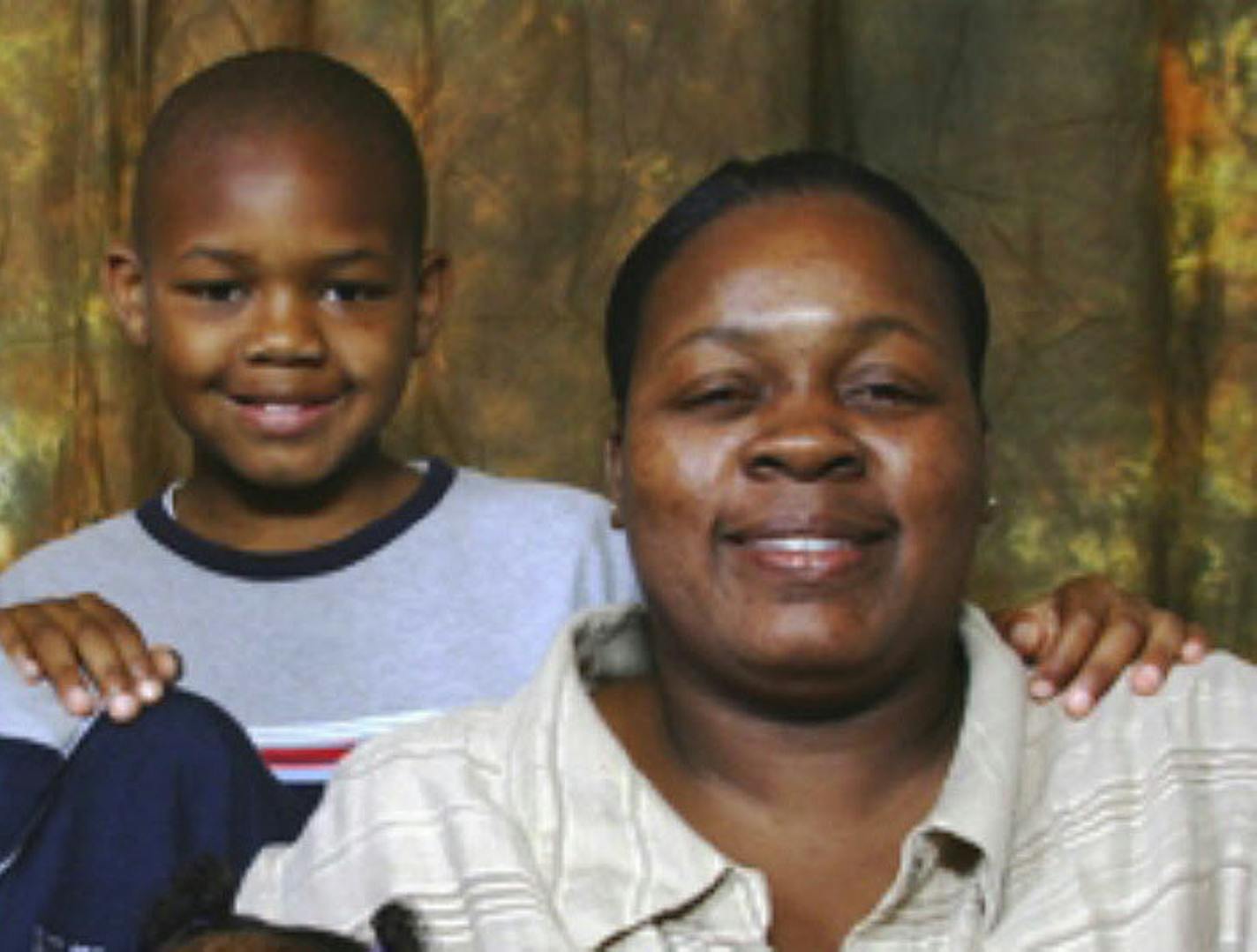 Robert Shepard, 10, and his mother, Katricia Daniels