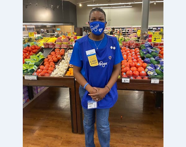 LaShenda Williams, who used to live in the parking lot of the East Nashville Kroger grocery store, now is an employee there. MUST CREDIT: Melissa Eads