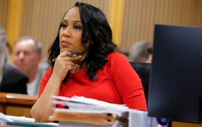 FILE - Fulton County District Attorney Fani Willis looks on during a hearing on the Georgia election interference case, Friday, March, 1, 2024, in Atl