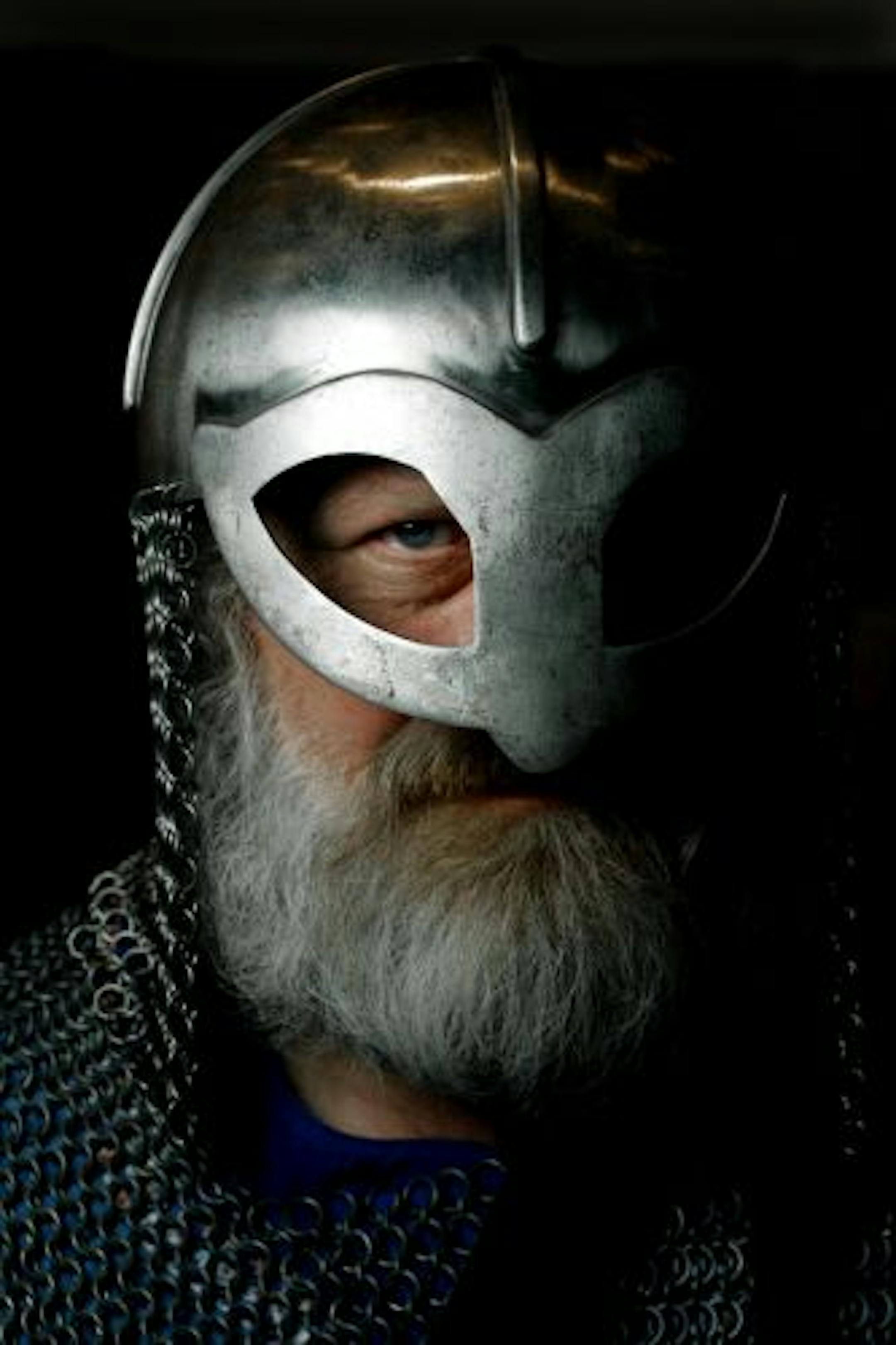 Gary Anderson dressed in the chain mail and helmet of a Viking warrior. GENERAL INFORMATION: St. Paul, Mn., Sun., Nov. Nov. 17, 2002--Costumed volunteers at the Science Museum Viking show.