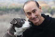 author Chris Bohjalian with a dog