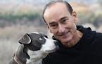 author Chris Bohjalian with a dog