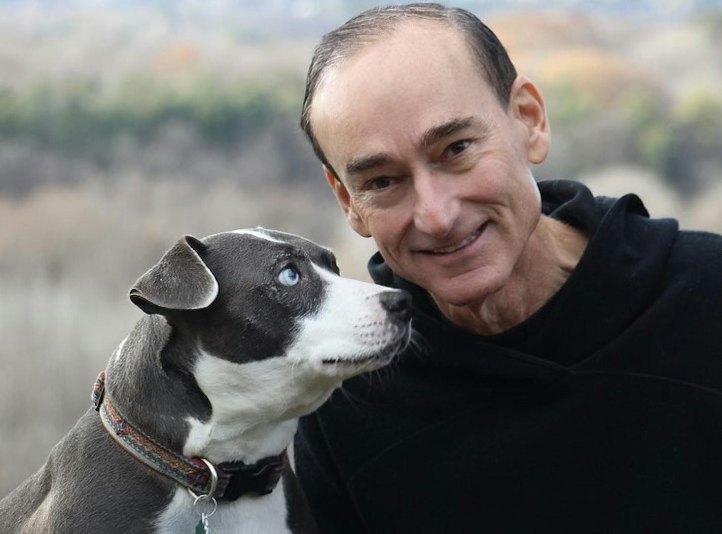 author Chris Bohjalian with a dog