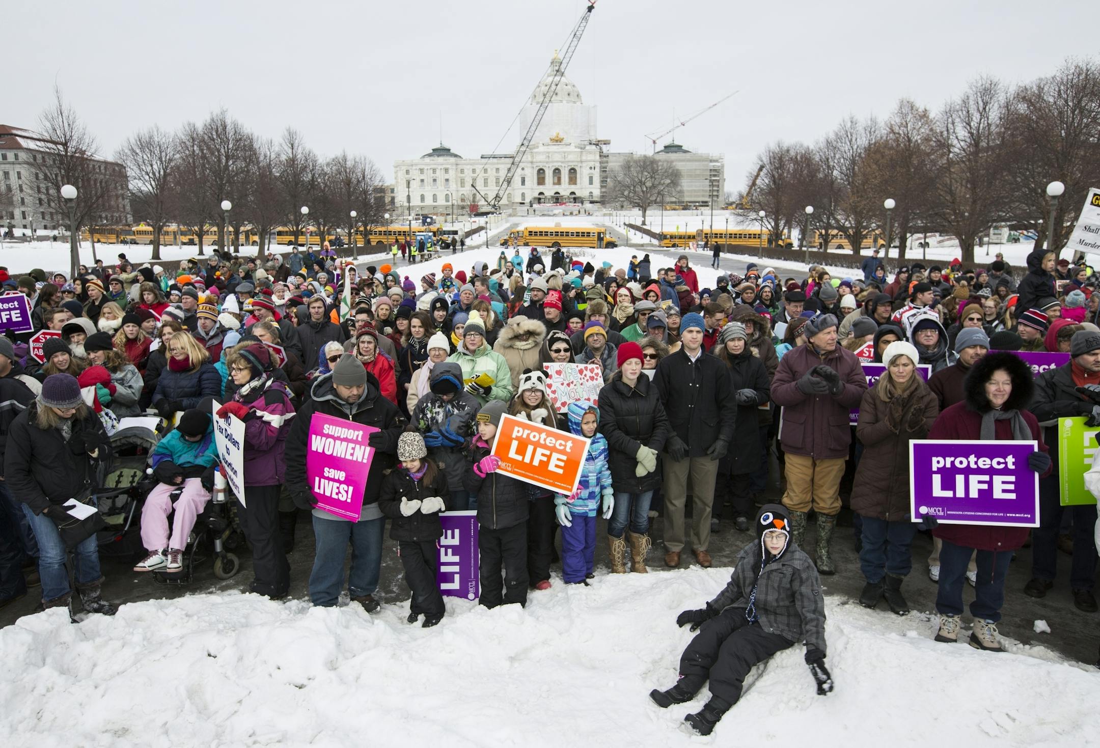 The crowd gathers to listen to speakers during the annual Minnesota Citizens Concerned for Life March for Life at the State Capitol Mall in St. Paul on Friday, January 22, 2016.