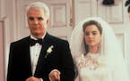 Steve Martin and Kimberly Williams-Paisley in a scene from the 1991 film "Father of the Bride," which poked fn at the escalating costs of a wedding an