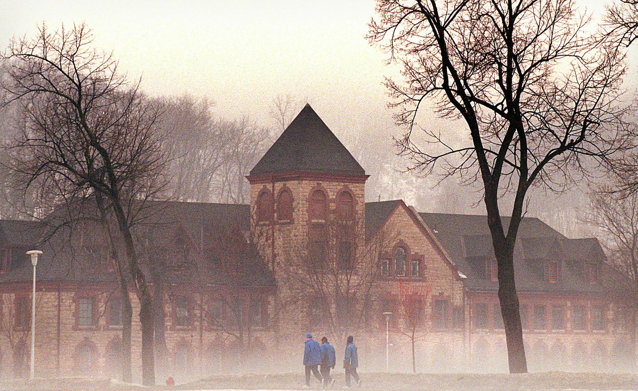 Story focuses on declining use of Red Wing juvenile center because now counties who want to send juveniles there must pay some of the fees. As a result, money has been lacking and we see what the impact has been, see what√≠s new there. We should have access to classes, etc., but of course can√≠t show an identifying photo. -- In this photo during a recent foggy morning, Blue jacketed residents at the Minnesota Department of Corrections at Red Wing walk from classes to