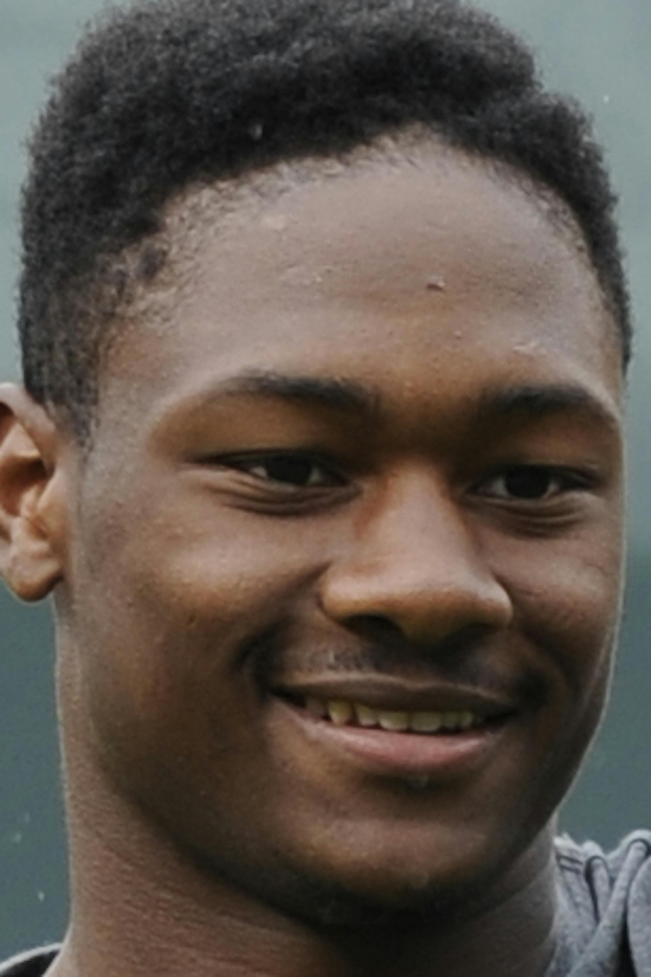 Maryland football player Stefon Diggs waves before throwing out the ceremonial first pitch before the Baltimore Orioles and Colorado Rockies baseball game, Sunday, Aug. 18, 2013, in Baltimore. (AP Photo/Nick Wass) ORG XMIT: OTKNY