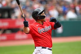 Cleveland Guardians first baseman Josh Naylor (22) hits a three-run home run off Minnesota Twins starting pitcher Sonny Gray during the first inning o
