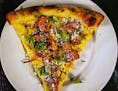 Star Tribune restaurant critic Jon Cheng ate his way through the North Loop: Pizza special at Snack Bar.