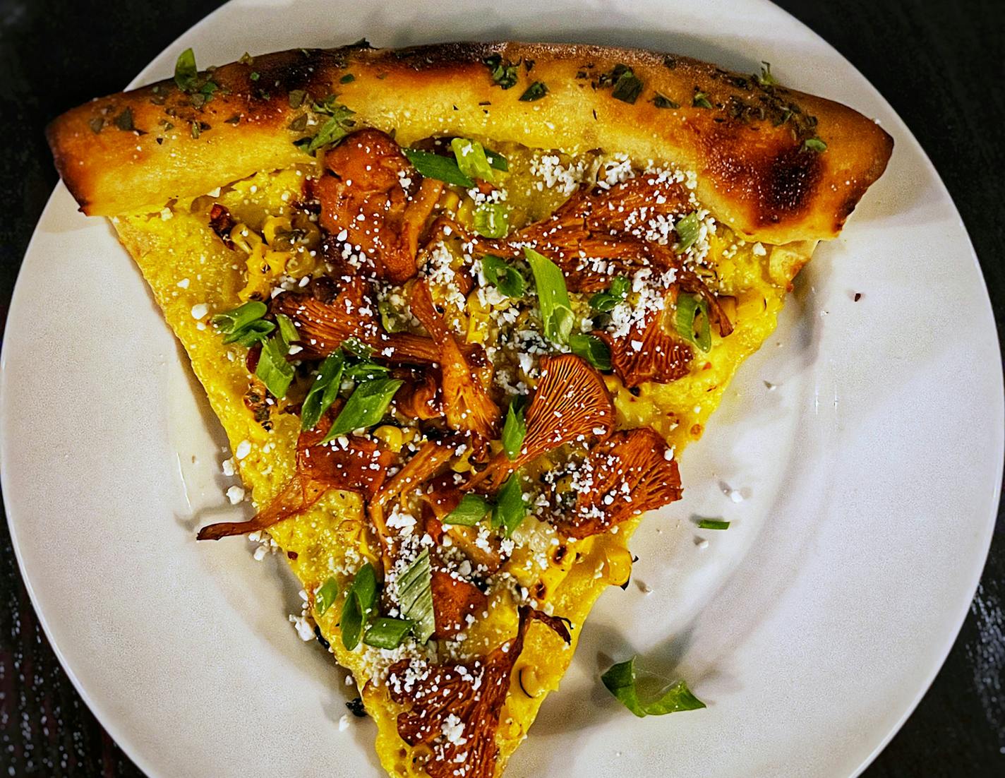 Star Tribune restaurant critic Jon Cheng ate his way through the North Loop: Pizza special at Snack Bar.