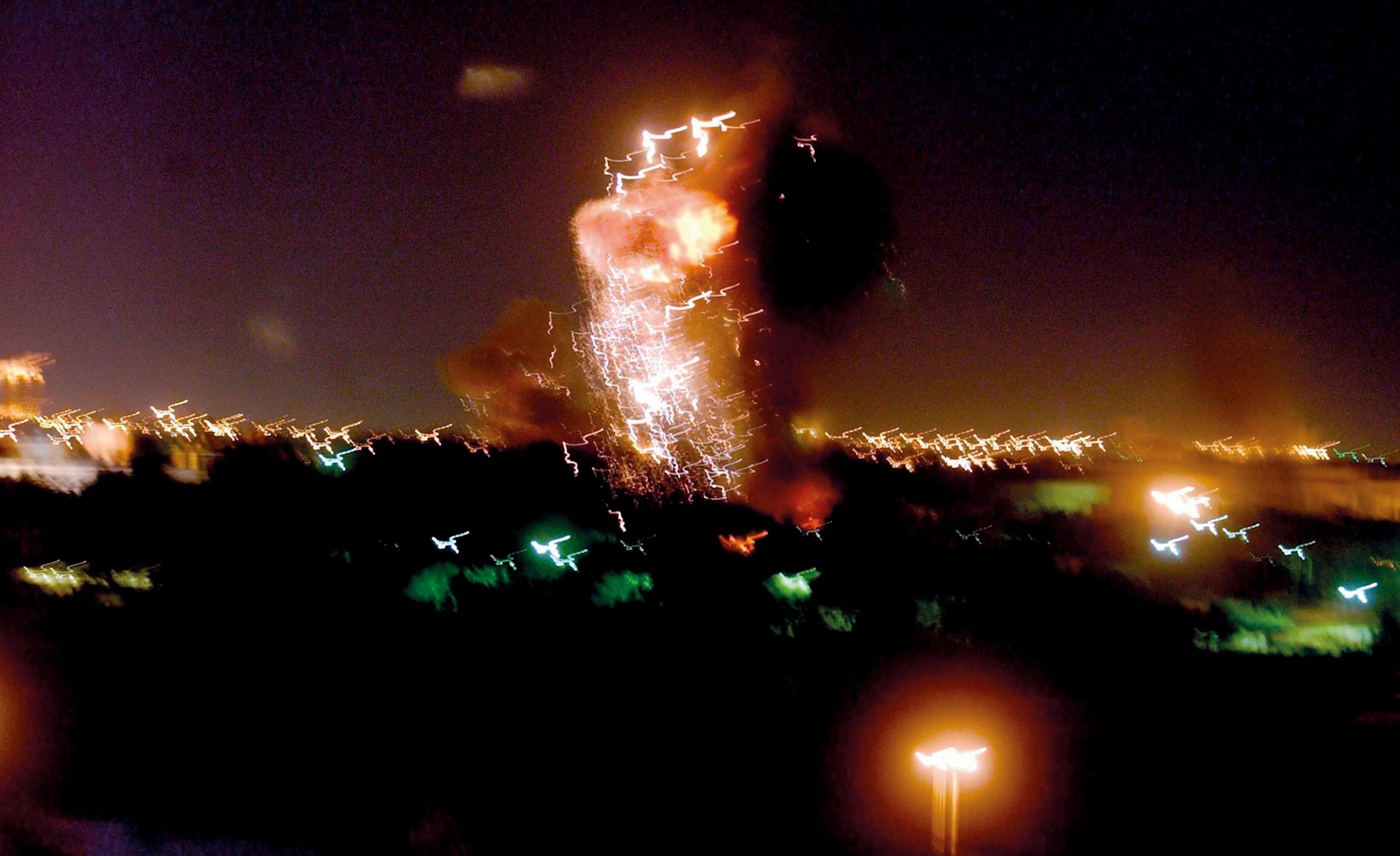 BAGHDAD, IRAQ— BC-OPINION-SAMAN-IRAQ-WAR-ART-NYTSF— A view of Baghdad after being hit by an American cruise missile during nighttime bombing on March 21, 2003. (Moises Saman for The New York Times) — ONLY FOR USE WITH ARTICLE SLUGGED — BC-OPINION-SAMAN-IRAQ-WAR-ART-NYTSF — OTHER USE PROHIBITED.