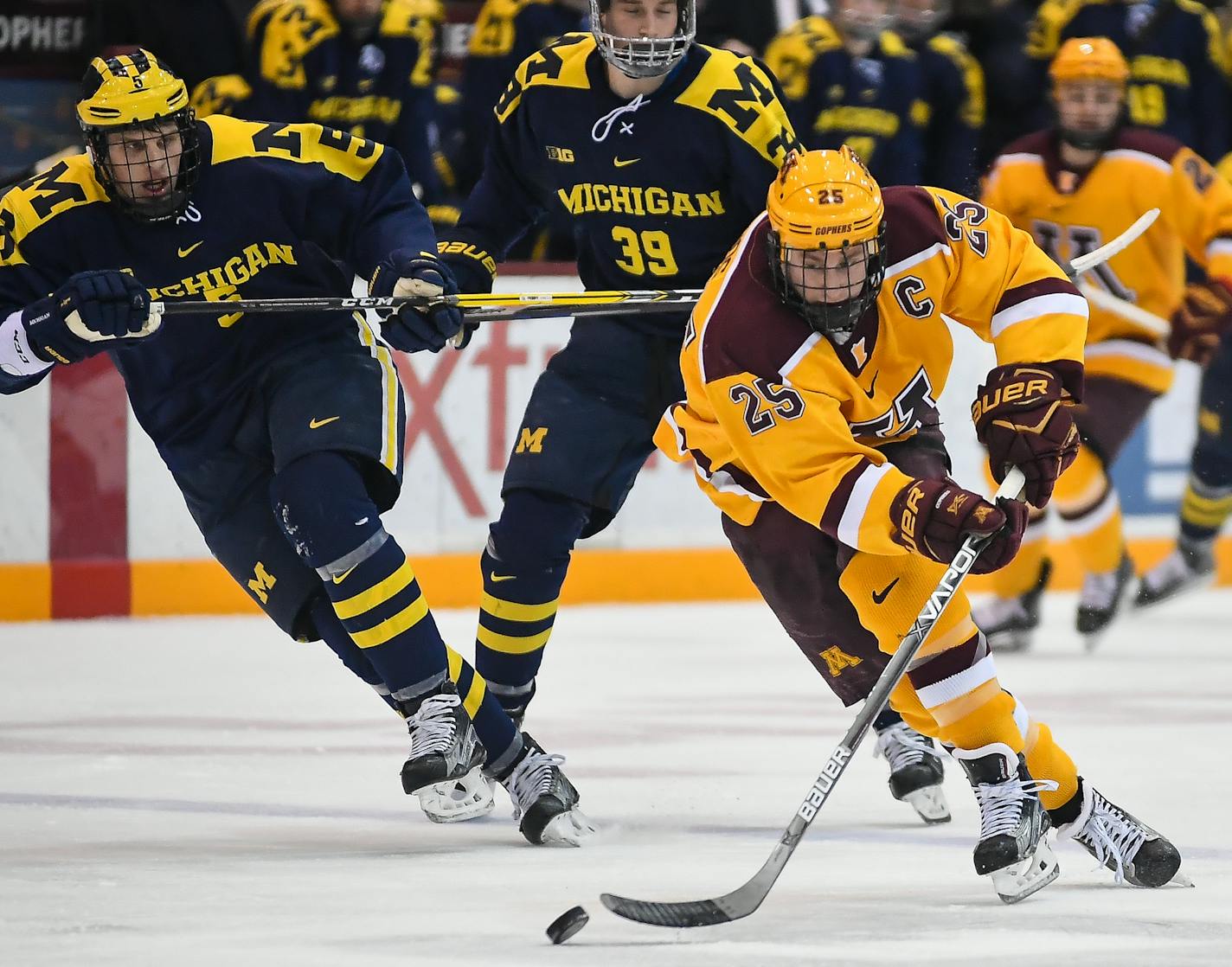 Minnesota Golden Gophers center Justin Kloos (25) raced down the ice with the puck during a second period breakaway agains the Michigan Wolverines. ] (AARON LAVINSKY/STAR TRIBUNE) aaron.lavinsky@startribune.com The University of Minnesota Golden Gophers played the University of Michigan Wolverines on Saturday, Jan. 14, 2017 at Mariucci Arena in Minneapolis, Minnesota. ORG XMIT: MIN1701142201361104