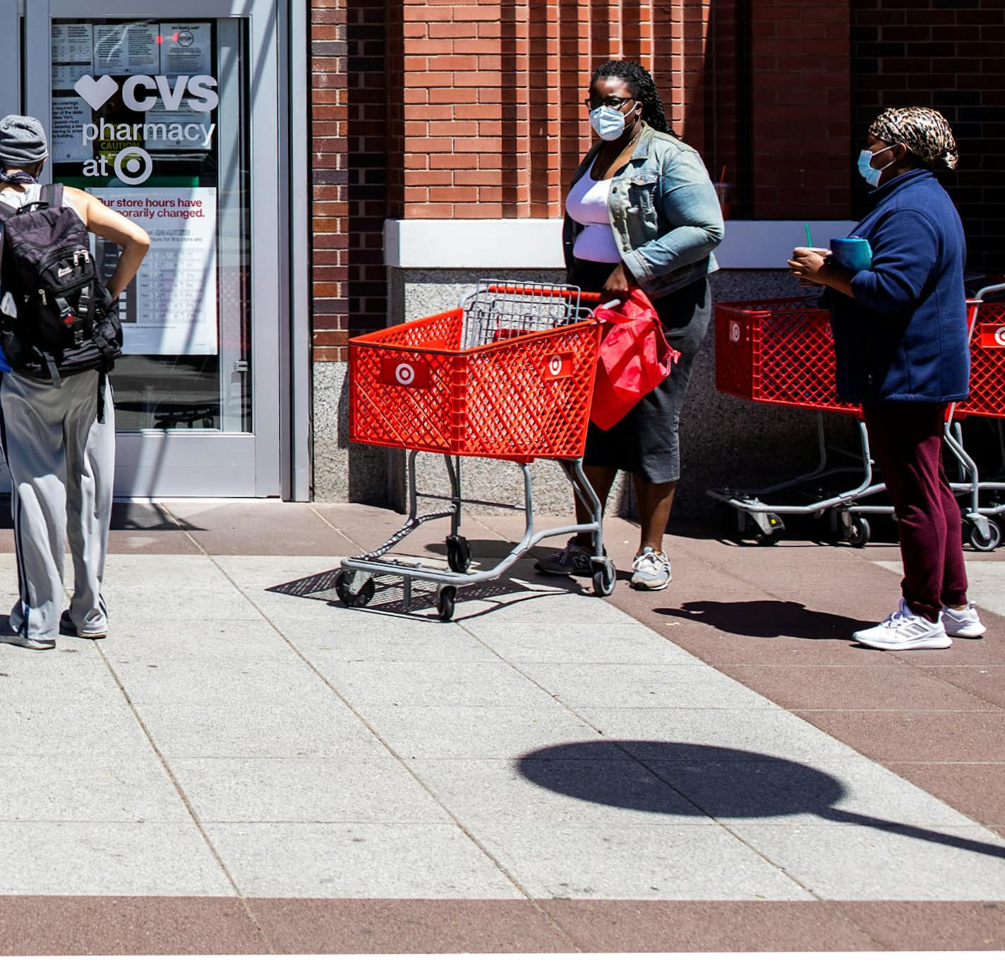 FILE -- Shoppers at a Target store in Brooklyn, May 31, 2020. Target reported that their second quarter was the greatest percentage increase in quarterly sales in the company's history, and several other big-box retailers have seen their sales surge during the coronavirus pandemic. (Demetrius Freeman/The New York Times)