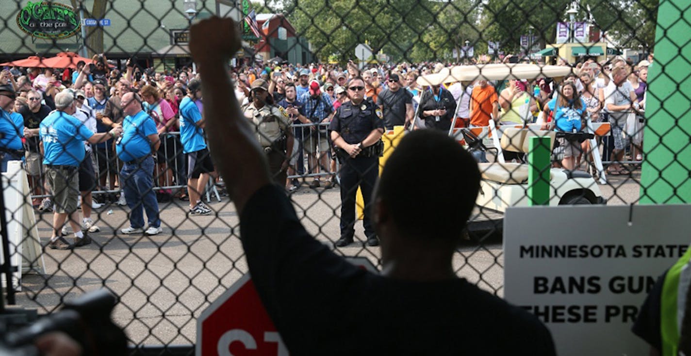 Black Lives Matter Reached and blocked the front gate of the Minnesota State Fair's on the first Saturday by assembling to deliver their message, Saturday, Aug. 29, 2015, in St. Paul. ORG XMIT: MIN1508291452110150